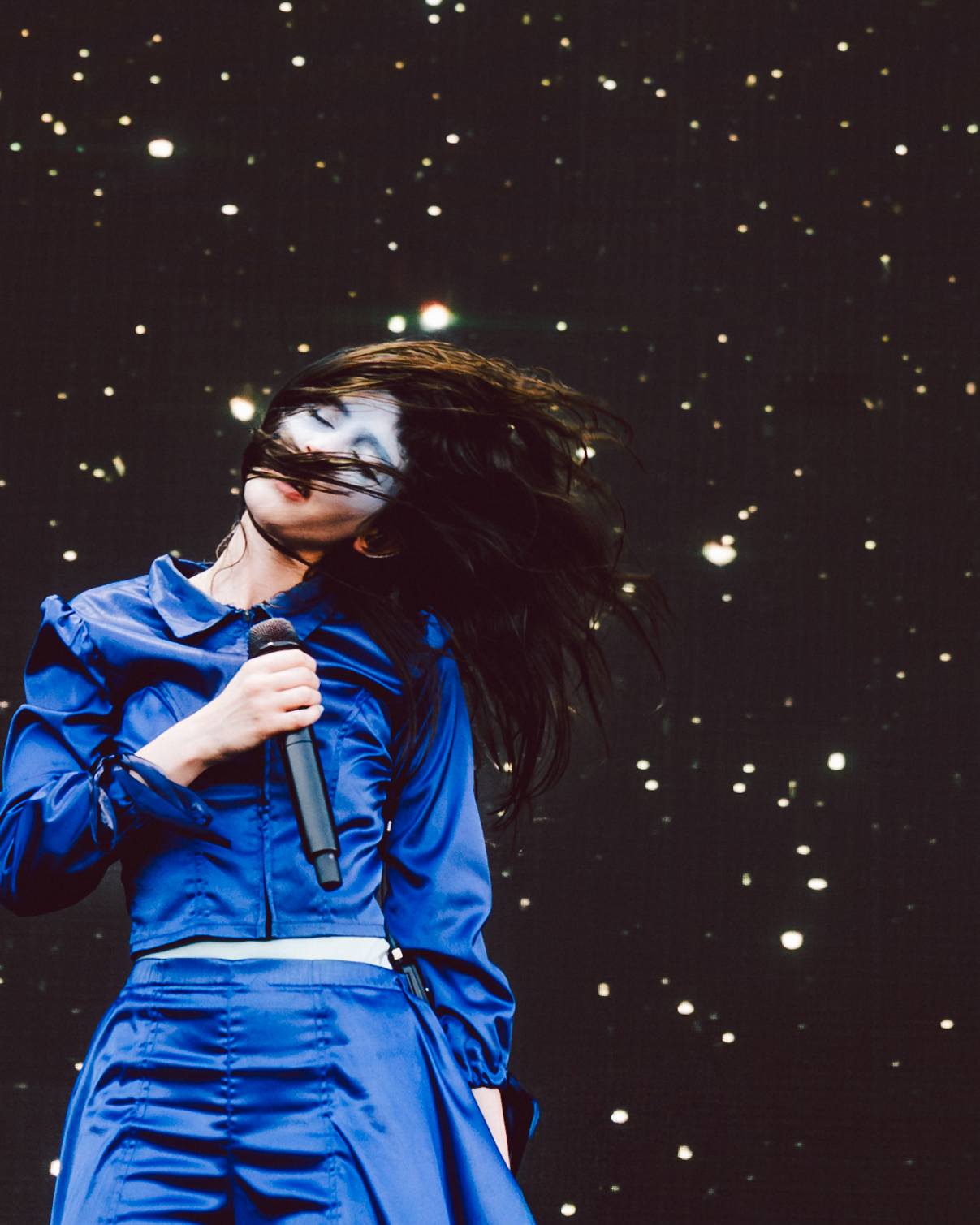A photo of the performer Magdalena Bay on stage at ACL music festival